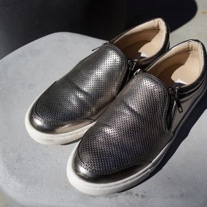 Slip on sneakers by Steve Madden.